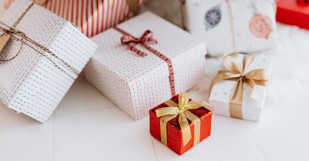 A collection of beautifully wrapped gift boxes with festive ribbons, perfect for holiday celebrations.